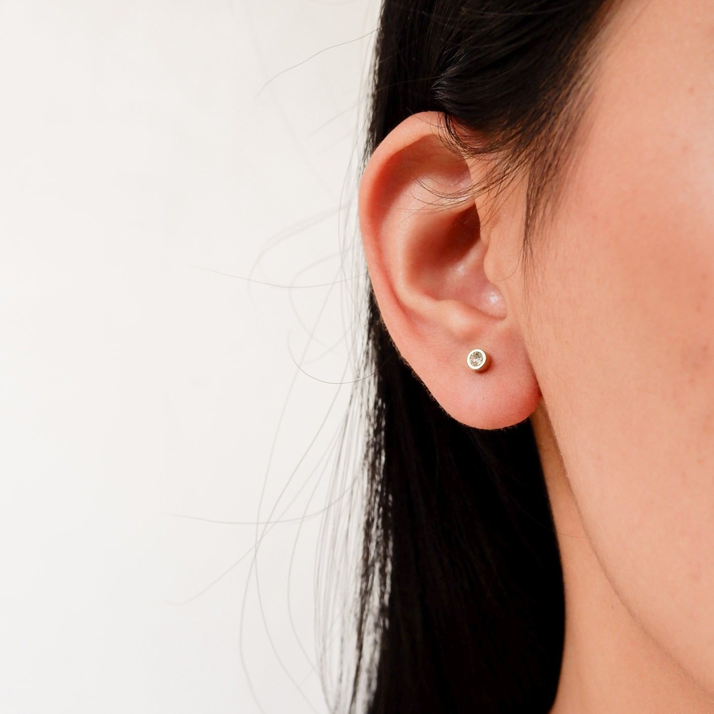 Zoey Gold Stud Earrings by Andrea